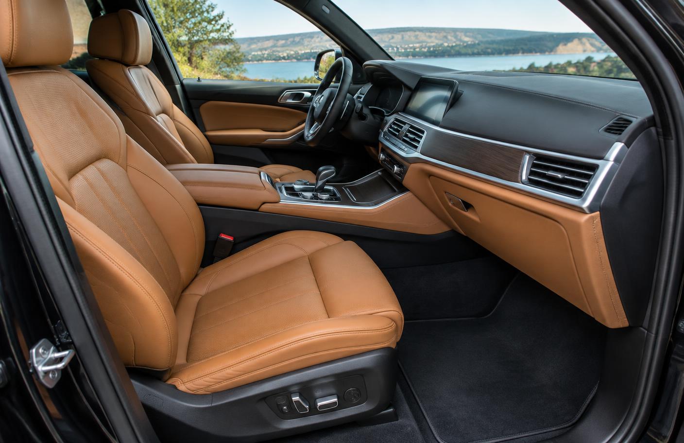 Clean leather seats and spotless interior of a freshly detailed SUV